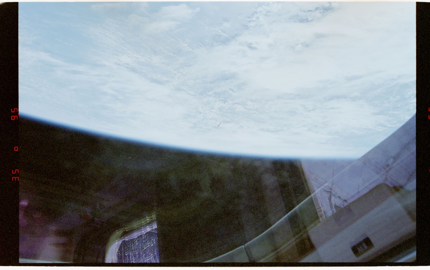 STS-80: unidentified object against clouds, 1996